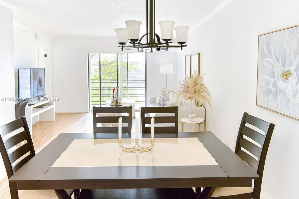Photo of 10405 Sunrise Lakes Blvd #311, Sunrise, FL 33322 (MLS # A11953990)