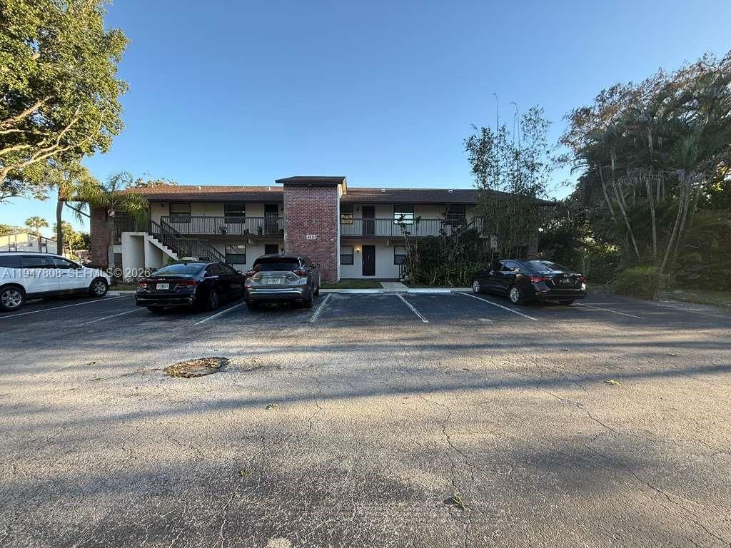 Photo of 6031 Shakerwood Cir #107, Tamarac, FL 33319 (MLS # A11947808)