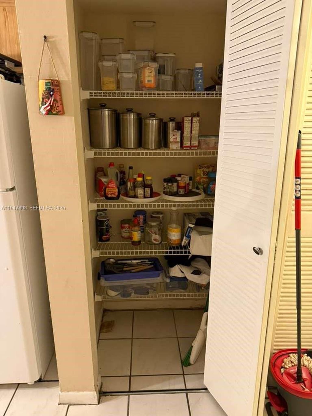 Photo of 6031 Shakerwood Cir #107, Tamarac, FL 33319 (MLS # A11947808)