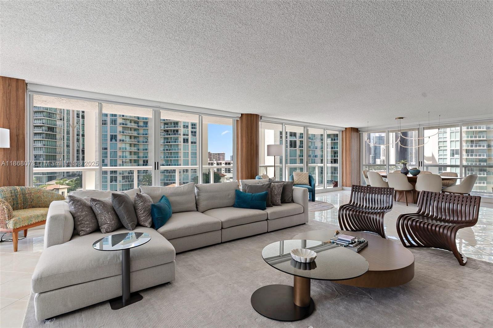 A Spacious and bright condominium featuring 3 bedrooms and 3 full bathrooms, ideally situated in the luxury Oceania complex. The residence spans apx 2340 sqft and offers sweeping water views from its large balcony. Community offers an extensive amount of resort-style amenities: 24-hour security with gated entry and valet parking, heated seeming pool, spa, fitness center with sauna, steam rooms, tennis court, access to private beach club, health club and spa. Within walking distance to upscale shopping, restaurants, school and so much more.