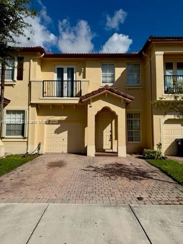 Tuscany Village Special! Experience resort-style living with exceptional amenities including two sparkling pools, a fully equipped gym, a clubhouse, playground, and 24/7 security patrol for your peace of mind. This spacious unit features generously sized bedrooms, an open-concept kitchen perfect for entertaining, and an attached garage for added convenience. Ideally located near top-rated schools, popular restaurants, shopping centers, and with easy access to major highways—commuting is a breeze. Don't miss this opportunity to live in one of the area's most desirable communities!
