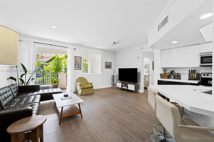 Enjoy stylish waterfront living in this fully upgraded 2-bedroom, 2-bath residence with stunning views throughout the community. The spacious primary suite offers a large walk-in closet, while the oversized second bedroom provides added flexibility.

The renovated kitchen features sleek cabinetry, stainless steel appliances, and modern flooring throughout. Two private balconies—one off the primary suite and one off the living room—invite seamless indoor-outdoor living.

Resort-style amenities include two heated pools, a fitness center, Pilates/Yoga studio, clubhouse, lighted tennis courts, and a BBQ pavilion. Pet-friendly and investor-friendly with rentals allowed up to 12 times per year.
Walk to Publix, dining, shopping, parks, and top-rated A+ schools—waterfront living at its best.
