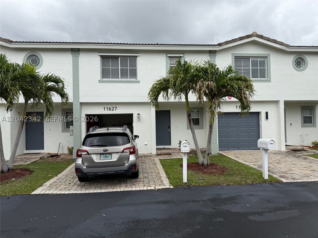 Photo of 11627 NW 23rd Ct #11627, Coral Springs, FL 33065 (MLS # A12042342)