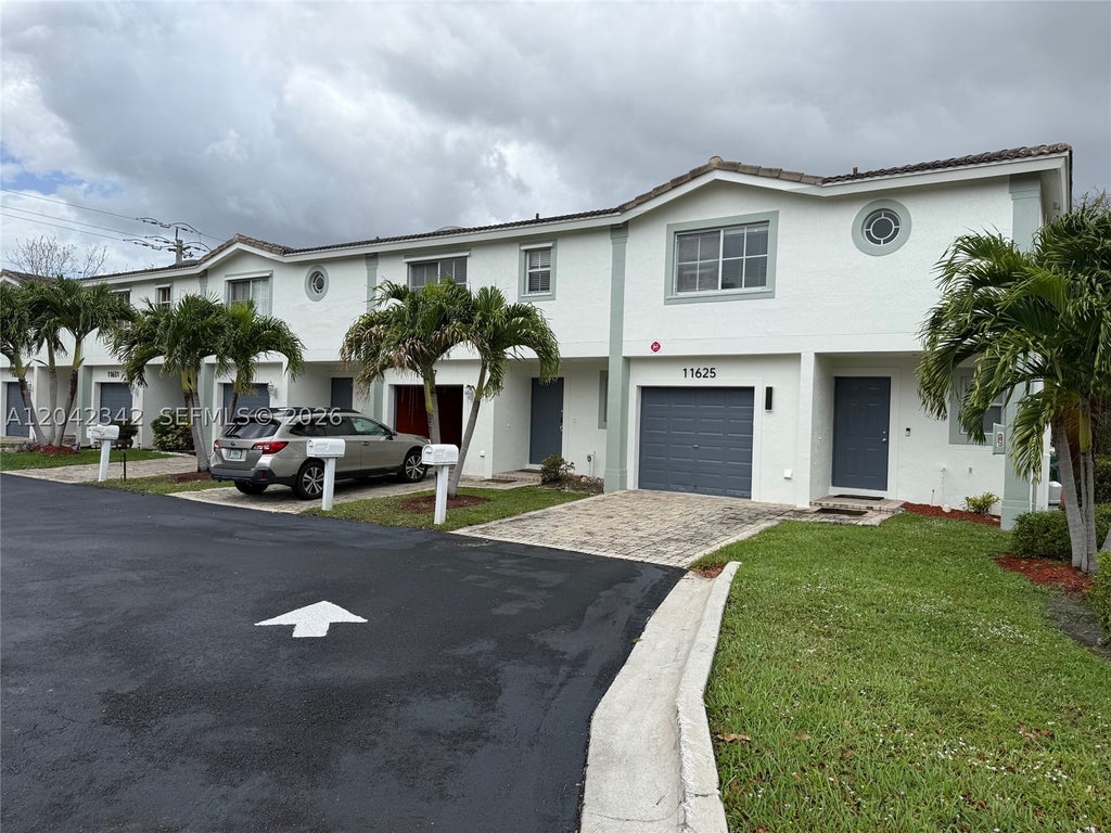 Photo of 11627 NW 23rd Ct #11627, Coral Springs, FL 33065 (MLS # A12042342)