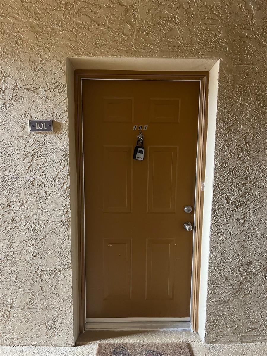 Completely remodeled 3/2 corner unit on the first floor in a secure gated community, freshly painted throughout, brand new tile floors, kitchen with beautiful counter tops, stainless-steel appliances and new bathrooms. A+ schools and right across the street from the Pembroke mall. Resort style amenities, gym, pool, racquet ball courts and much more. Two parking spaces assigned right in front of the unit.