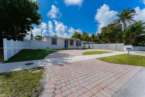 Photo of 1474 NE 48th Ct, Pompano Beach, FL 33064 (MLS # A11985884)