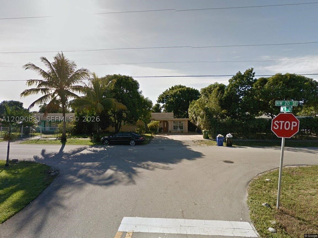 Photo of 1160 NW 20th St, Fort Lauderdale, FL 33311 (MLS # A12090831)