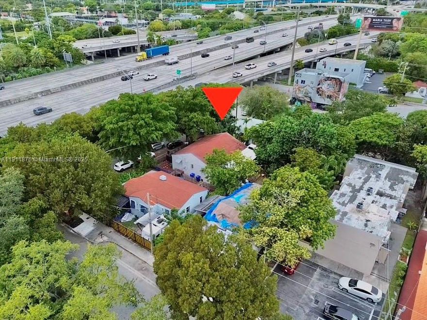 Legal duplex in Wynwood featuring two fully independent units and three total bathrooms, positioned for strong value-add upside. Zoned T5 (6101/CEN-Pedestrian Orientation), the property supports expansion into 3–4 units, ADU construction, or a boutique live/work setup. Located in Flood Zone X with excellent walkability and direct access to Wynwood, Midtown and the Design District. Ideal for investors seeking cashflow + development potential in a high-growth corridor.