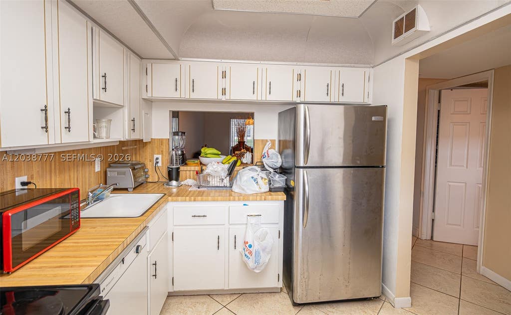 Photo of 3531 Inverrary Dr #108, Lauderhill, FL 33319 (MLS # A12038777)