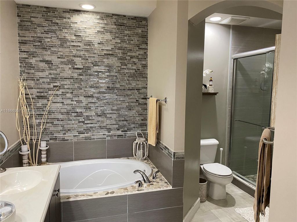 Photo of 3020 NW 125th Ave #311, Sunrise, FL 33323 (MLS # A11666357)