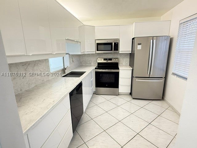 Photo of 1025 SE 4th Ave #101, Dania Beach, FL 33004 (MLS # A11876312)
