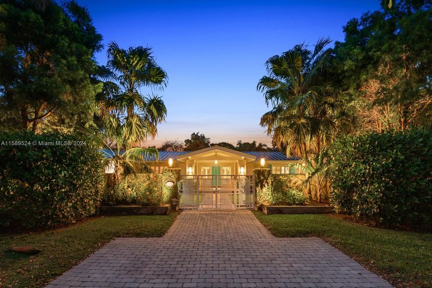 This North Pinecrest walled & gated 1-story resort-style estate truly has it all: 4919 gross living area per appraisal on a 35,109 sq. ft. lot, 4/4, a car collector's dream air-conditioned 4-car-garage with lift, security system, work-station & loft, luxurious poolside primary suite w/ double walk-in closets, master chef's kitchen w/ top-of-the-line appliances & newly installed quartz counters, dramatic high-ceilinged main living room & formal dining room, new 4th bedroom & laundry room added in 2023, capacious covered terrace w/fully outfitted summer kitchen, flex space: gym/yoga studio or air conditioned space for 2 cars, resort-style pool & spa, native plantings, koi pond, whole house generator & more! Public Schools are "A" schools: Pinecrest Elementary. & Palmetto High