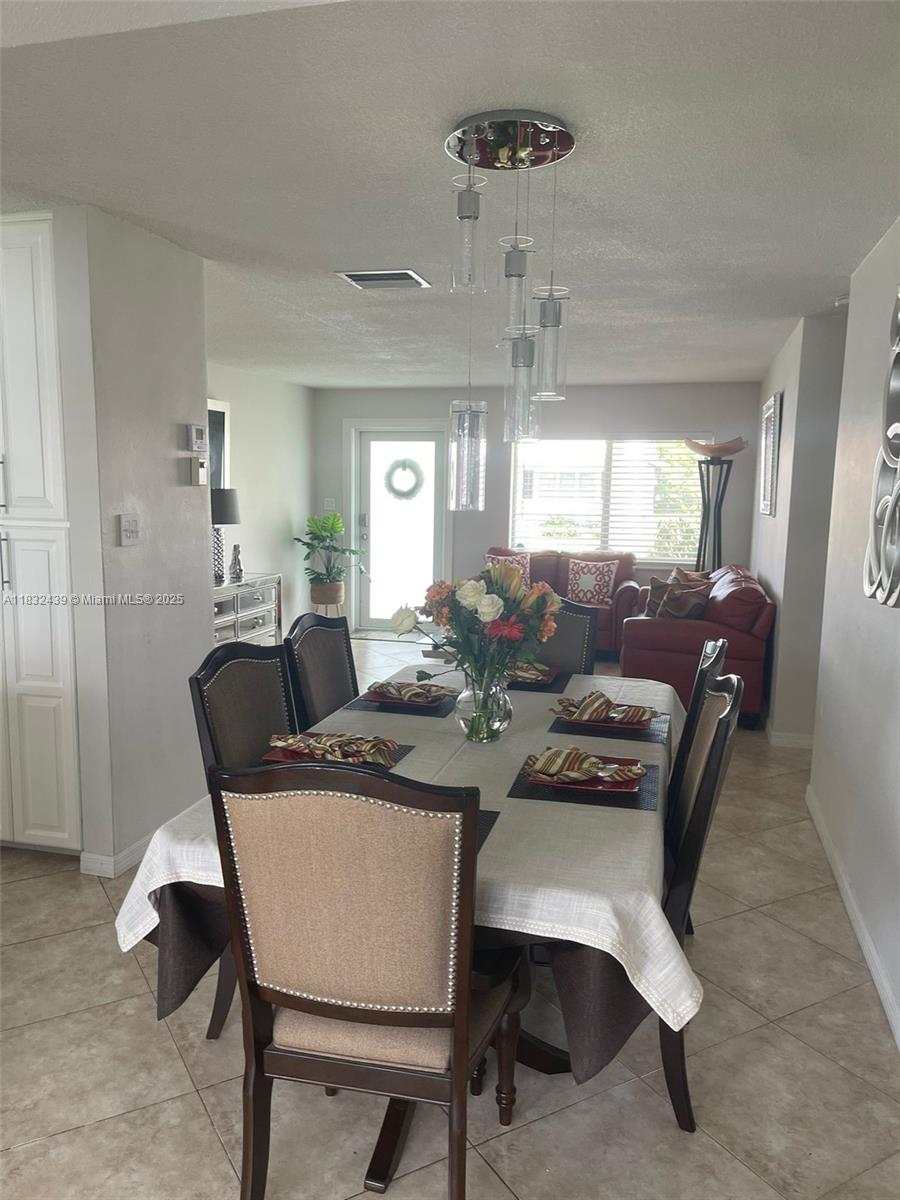 8312 NW 59th St