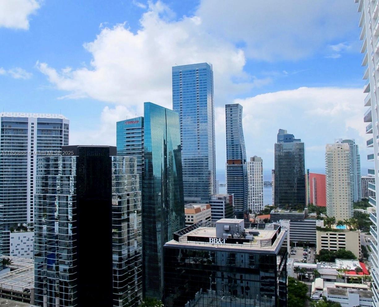 Be in the heart of it all at 1060 Brickell! This stunning 31st-floor corner 1BD/1BA offers breathtaking bay & city views from every angle. Features include porcelain floors, custom walk in closets, a modern kitchen with stainless steel appliances, and a marble-finished bath with an oversized soaking tub and unique view down Brickell. Enjoy top-notch amenities in one of Brickell’s most sought-after buildings: an oversized pool deck, fitness center, virtual golf, and 24-hour concierge. Live where the energy of the city is right at your doorstep!
