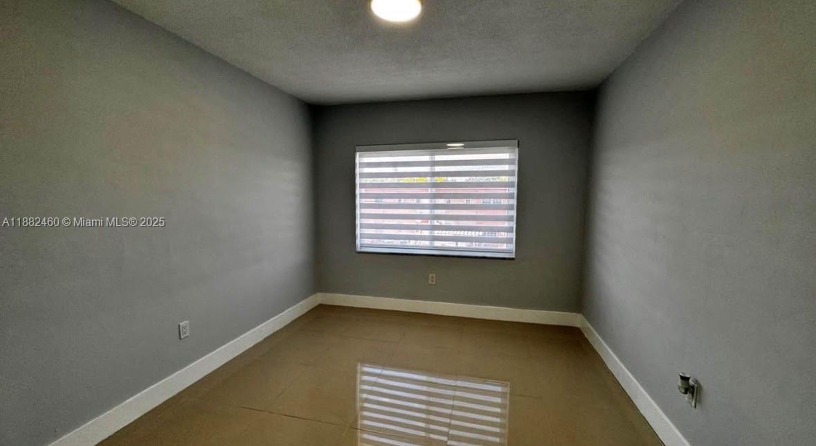 CORAL GARDENS CONDO BLDG - Residential Lease