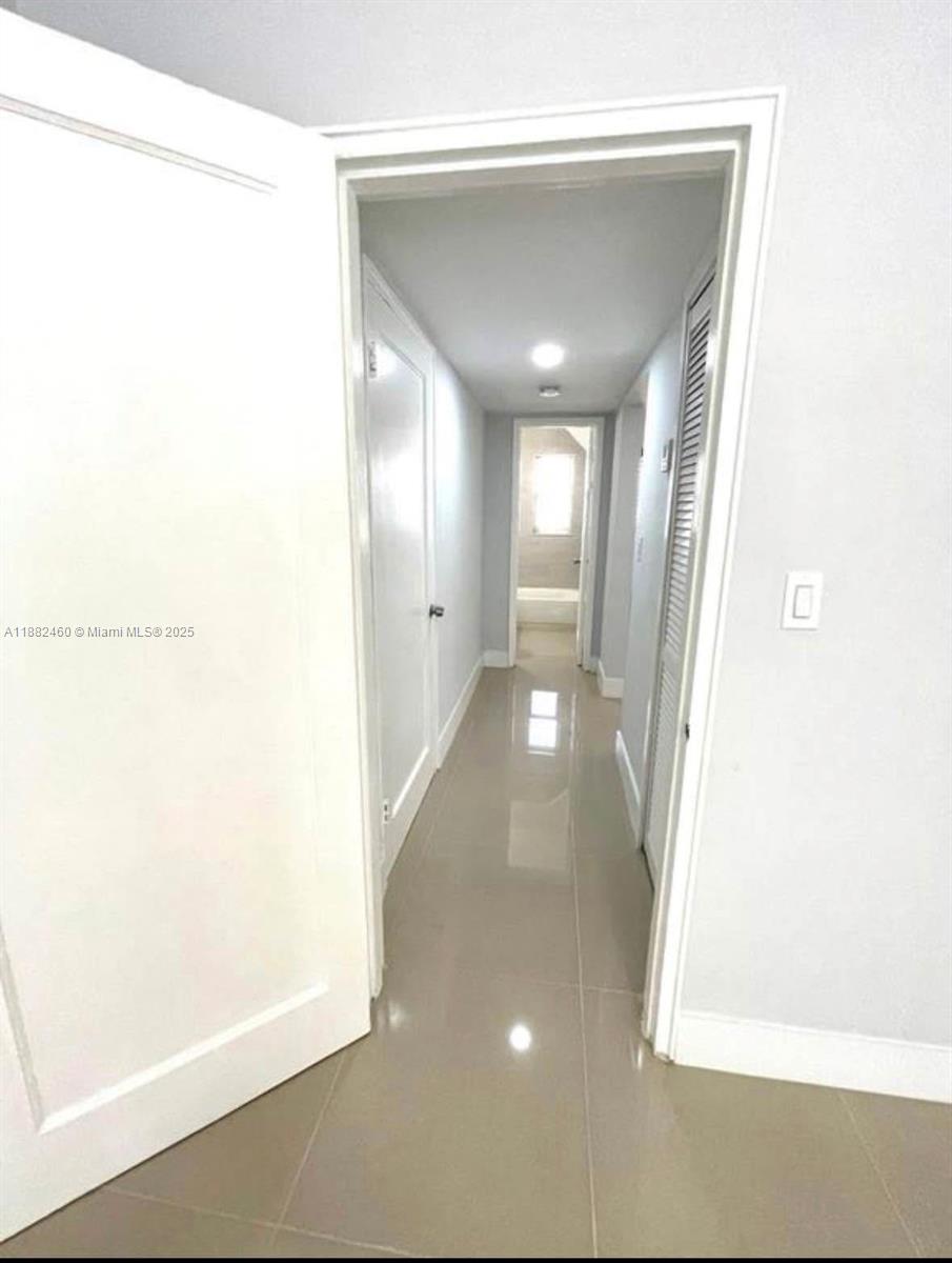 CORAL GARDENS CONDO BLDG - Residential Lease