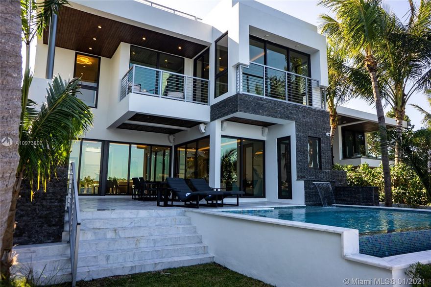 BRAND NEW CONSTRUCTION 2021. 2 STORIES WATERFRONT HOME . MODERN DESIGNED WITH LUXURY MATERIAL , ALL ITALIAN MARBLE THROUGHOUT INCLUDED SMART-HOME;ALRM SYSTEM; OPEN CONCEPT GOURMET CHEF’S KITCHEN WITH NATURAL GAS MIELE APPLIANCES; LARGE 5 BEDROOMS; 5.5 BATHS ; IMPACT WINDOWS; APPROX. 4000 SF UNDER AIR; SUMMER KITCHEN WITH /BBQ NICE ENTERTAINMENT, INCREDIBLE ROOF-TOP TERRACE WITH DRAMATIC  360 WATER VIEWS TO MOST EXPANSIVE INDIAN CREEK  AND DOWNTOWN  INFINITY POOL FACING ALL MANSIONS AND COUNTRY CLUB ; NEW SEAWALL AND NEW DOCK FOR BOATS AND ROOM FOR JET SKIS WITH SO MUCH MORE ! THIS PROPERTY HAS ALL INTERIOR DESIGNED FROM VESTA . BUY THIS AMAZING PROPERTY AS A TURNKEY  !
