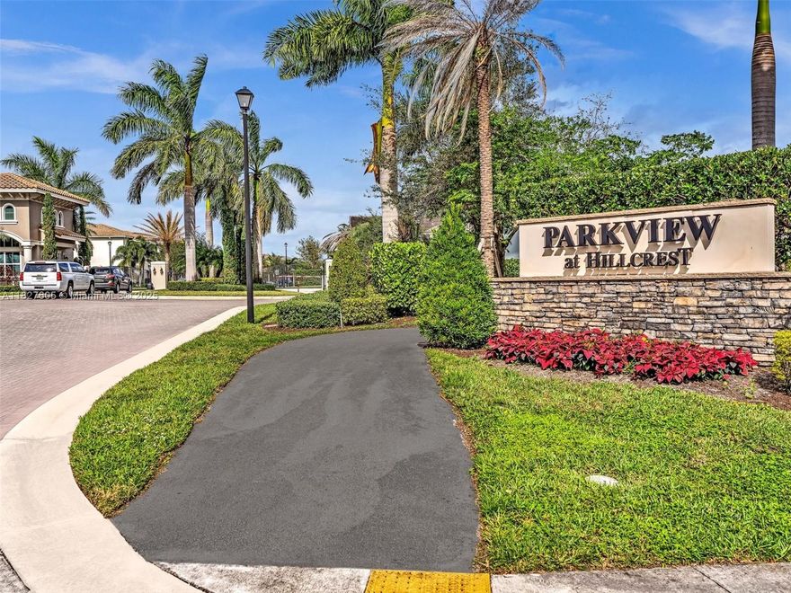 PRICE TO SALE! Welcome to the newest gated community in Hollywood! Resort style living! this Cozy Townhouse features high ceilings, laundry room with washing sink, Front Porch, Spacious open floor plan, 1 car Garage and 2 cars driveway. This 3 beds 2.5 baths Townhouse offers Hurricane Impact windows and doors, Huge master bedroom with custom made black-out blinds, floors have been updated with wood-like tile. PARKVIEW AT HILLCREST offers State of the Art amenities such as Fitness center, Swimming Pool, BBQ Stations, Picknick Area, Tennis court, Tot lot, Clubhouse and 70 Acres trail park! Community is pet friendly. Great location only 15 mins from Aventura mall, Hard Rock Casino, Hollywood Beach and Ft. Lauderdale Airport