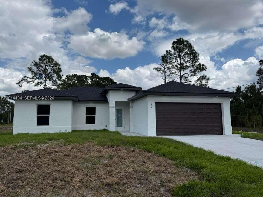 Brand New Construction in Lehigh Acres! Beautiful newly built home featuring 3 bedrooms, 2 full bathrooms, and a 2-car garage. This modern property offers porcelain tile flooring throughout, impact windows and doors, high ceilings, stainless steel appliances, quartz countertops, and a spacious open-concept layout perfect for everyday living and entertaining. Enjoy a dedicated laundry room, epoxy garage floor, and a covered lanai overlooking the canal for added privacy and relaxation. Great opportunity for homeowners or investors in a fast-growing area of Lehigh Acres. The adjacent lot may also be available for purchase separately and can be negotiated independently from the home sale.