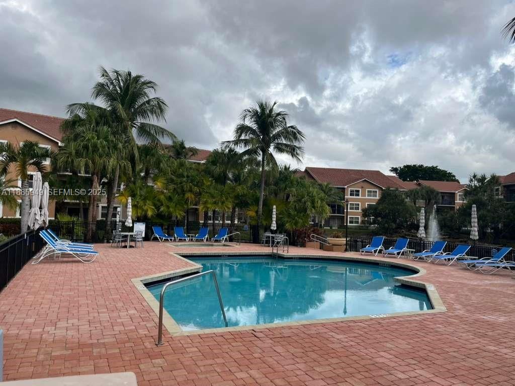 Photo of 8821 Wiles Rd #102, Coral Springs, FL 33067 (MLS # A11885949)