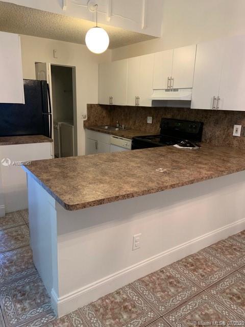 WOODSCAPE TOWNHOMES CONDO - Residential