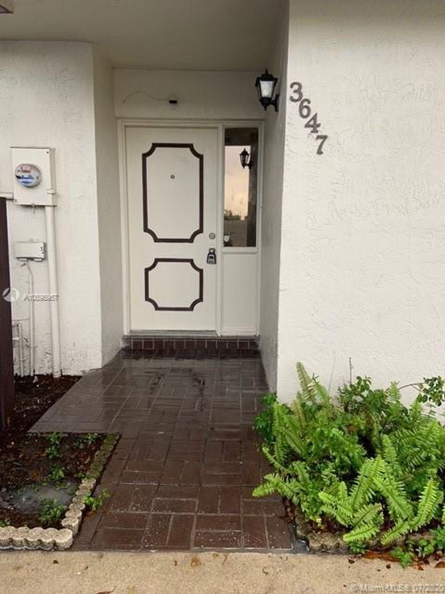 PRICE TO SELL, 3 BEDROOMS & 2 FULL BATHROOMS  TOWNHOUSE LOCATED AT WOODSCAPE TOWNHOMES CONDO IN MIRAMAR CONVENIENTLY LOCATED CLOSE TO TURNPIKE, TITLE & LAMINATE FLOORS, VAULTED CEILING, SPACIOUS LIVING ROOM, COMMUNITY POOL, TENNIS COURT. PROPERTY IS NOT APPROVED FOR FHA, NEW OWNER MUST OWN FOR 24 MONTHS BEFORE ALLOWED TO RENT OUT AS PER CONDO ASSOCIATION. SUPER LOW CONDO ASSOCIATION $ 100.