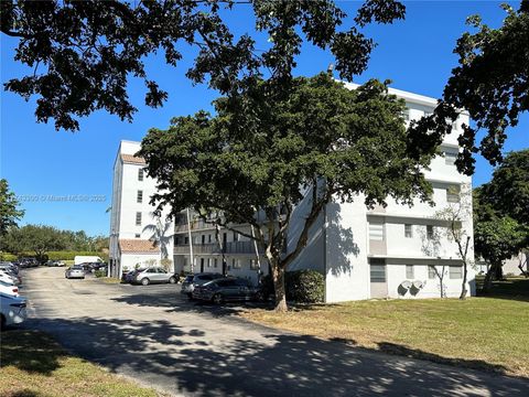 Photo of 8750 N Sherman Cir #102, Miramar, FL 33025 (MLS # A11743300)