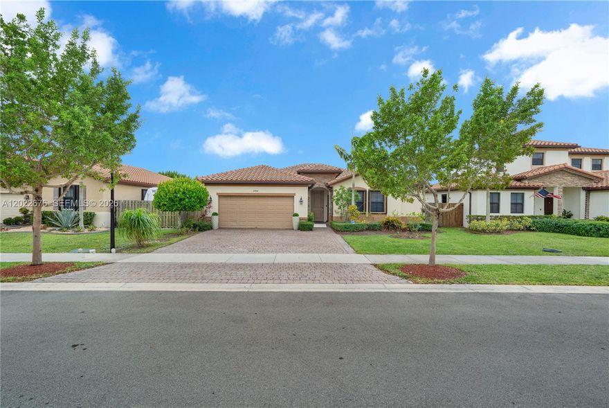 Welcome to this beautiful single-family home in the desirable gated community of Portovita. This home features 4 bedrooms and 3 bathrooms, a modern open-concept kitchen complete with stainless appliances. Spacious layout includes a family room, formal dinning room, living room, a great room with an in-law quarters. This home features valuable upgrades, roof-mounted solar panels for enhanced energy efficiency and accordion shutters. Step outside to your private backyard oasis featuring a covered terrace patio, fenced yard and serene lakefront view. Residents enjoy access to resort-style community amenities, clubhouse, pool, fitness center. Conveniently, located near schools, hospital, grocery stores, shopping plaza, restaurants and easy access to the Florida Turnpike.