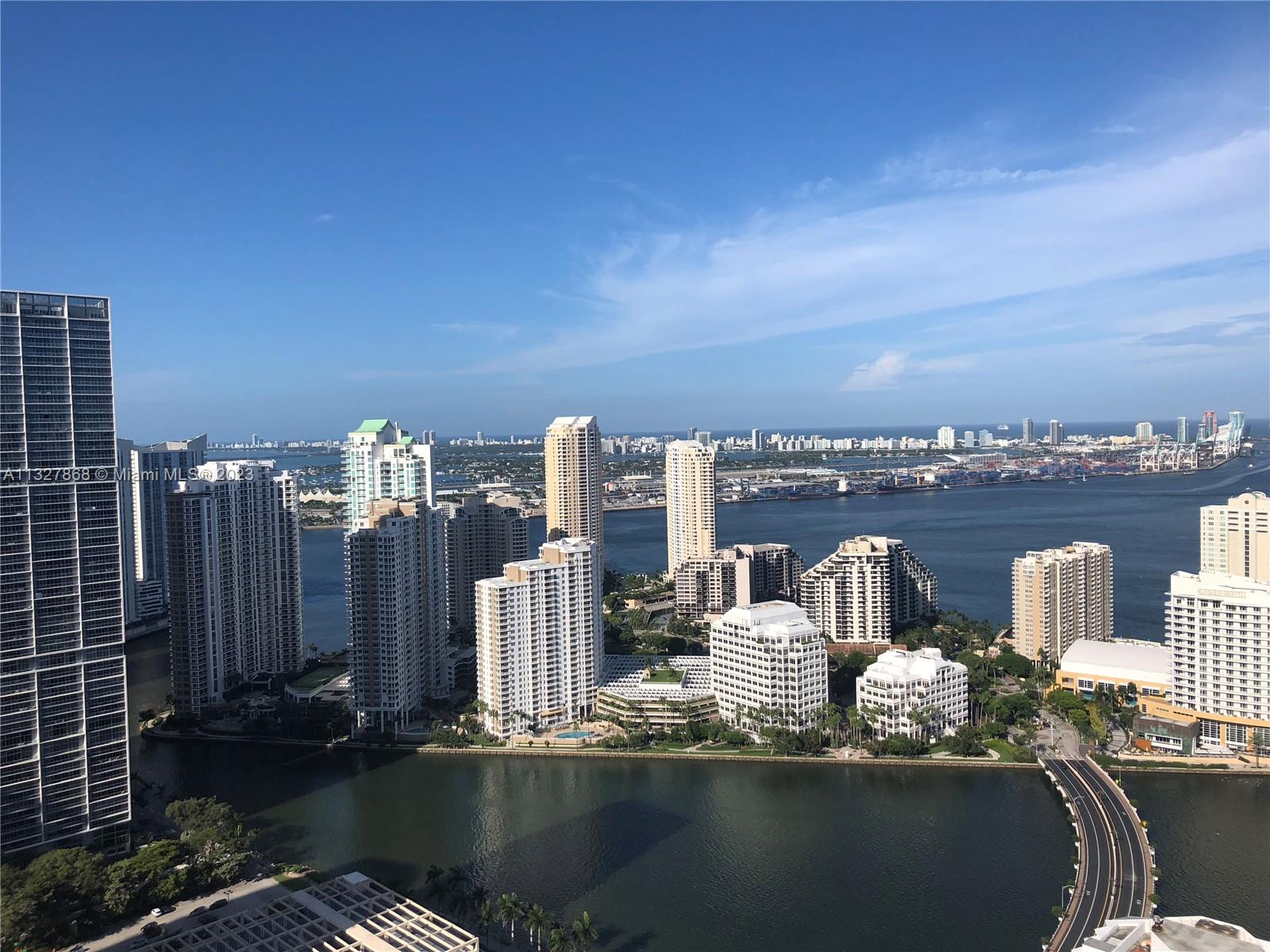 Amazing 1/1 with partial Biscayne Bay & city views. Laminate floors throughout the unit. Residence features modern high ceilings, stainless steel appliances imported italian cabinetry. Amenities:24 hr security and concierge, 24 hour valet parking, State of the art Fitness Center in each tower, 2 Infinity-edge heated pools, Steam room,Theater room, Business center, party room, pool table & lounge. Walk to Mary Brickell Village and Brickell City Center mall. Minutes away from American Airlines Arena & Performing Arts. Water, basic cable & internet included. One assigned parking space.