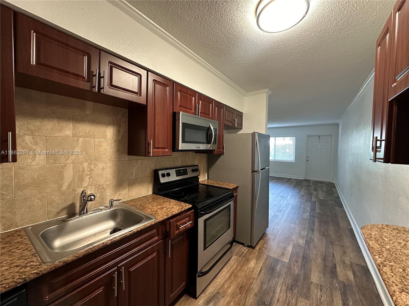LOCATION!!! Coastal living at its finest! Live 2 blocks away from the ocean in this quiet, charming Deerfield Community. Beautiful and spacious 2nd floor, corner unit - 2 bedroom 1 bath apartment with top-tier upgrades and a large, private screened-in balcony/porch! Comes with 2 assigned parking space right in front of property. Unit is upgraded with new flooring and lighting. Features granite countertops, wooden cabinets, dishwasher, central AC, and multiple closets for plenty of storage. Community is located right on the inter-coastal with a picnic area for residents. Walking distance to beach, the Cove shopping center, amazing restaurants, bars, shops, parks & more. Laundry in building and on each floor. Water, waste, sewer included in rent. Pets welcome with 1x non-refundable pet fee.
