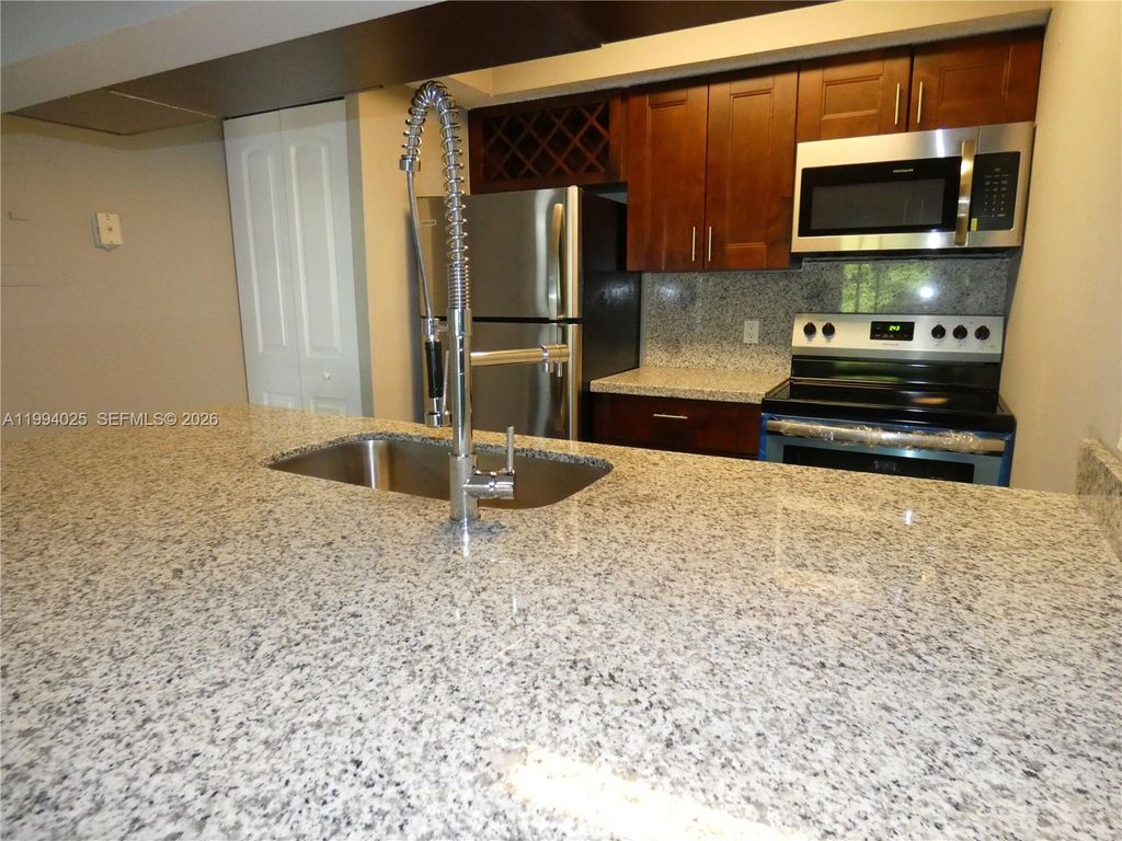 Photo of 5740 Rock Island Rd #291, Tamarac, FL 33319 (MLS # A11994025)