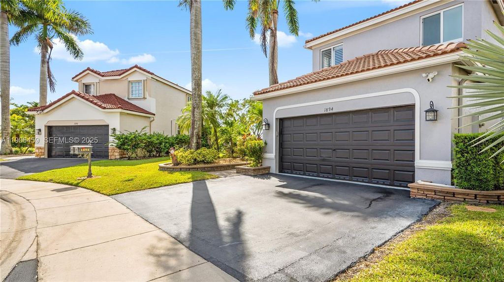 Photo of 1894 Aspen Ln, Weston, FL 33327 (MLS # A11906459)