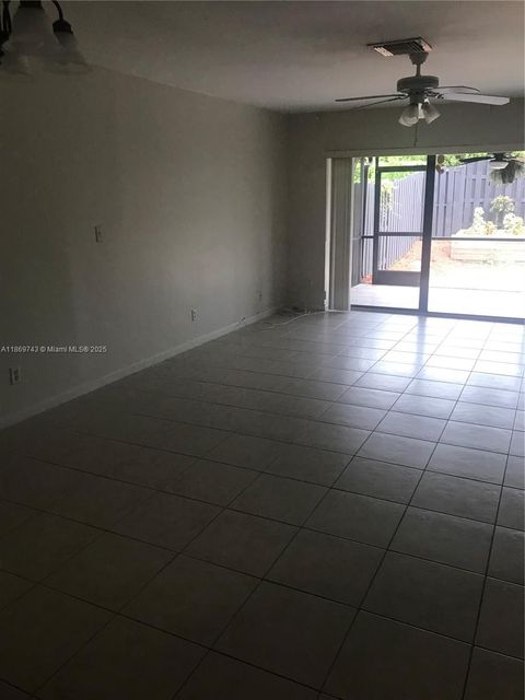 Photo of 9170 NW 44th Ct, Sunrise, FL 33351 (MLS # A11869743)
