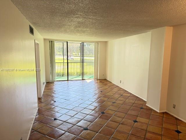 ENSENADA CONDO BLDG E-II - Residential Lease