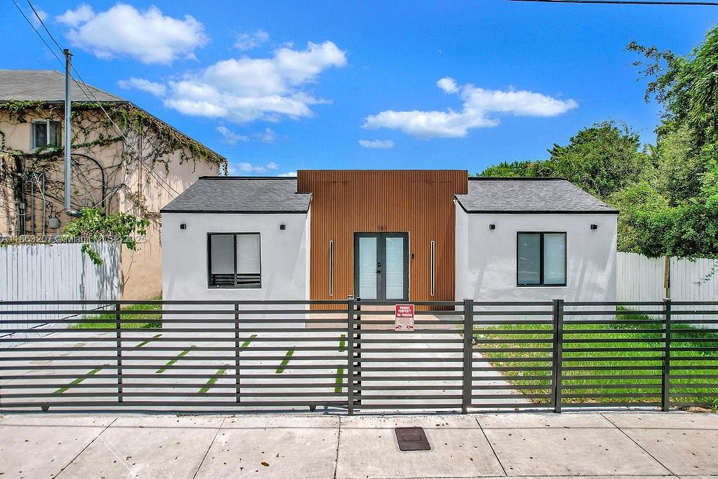 Stunning modern & fully remodeled home for rent. This home offers four bedrooms and three bathrooms and is located in the heart of Buena Vista. With beautiful wood panels, this fully remodeled home offers comfort and style. With Over 1,600 Sqft of living space, a brand new kitchen with state-of-the-art smart appliances, custom kitchen cabinetry, lavish stone island, elegant tile flooring, new bathrooms with rainfall showers, and tile finishes. An oversized lot of 7,200 Sqft, fenced backyard that offers amenities such as a tennis/basketball court, a large pool with a wood deck, a large patio, and a grass area perfect for hosting. Buena Vista is one of Miami's fastest-growing neighborhoods. Minutes away from the Design District, Midtown shops, Wynwood Art District, and more.