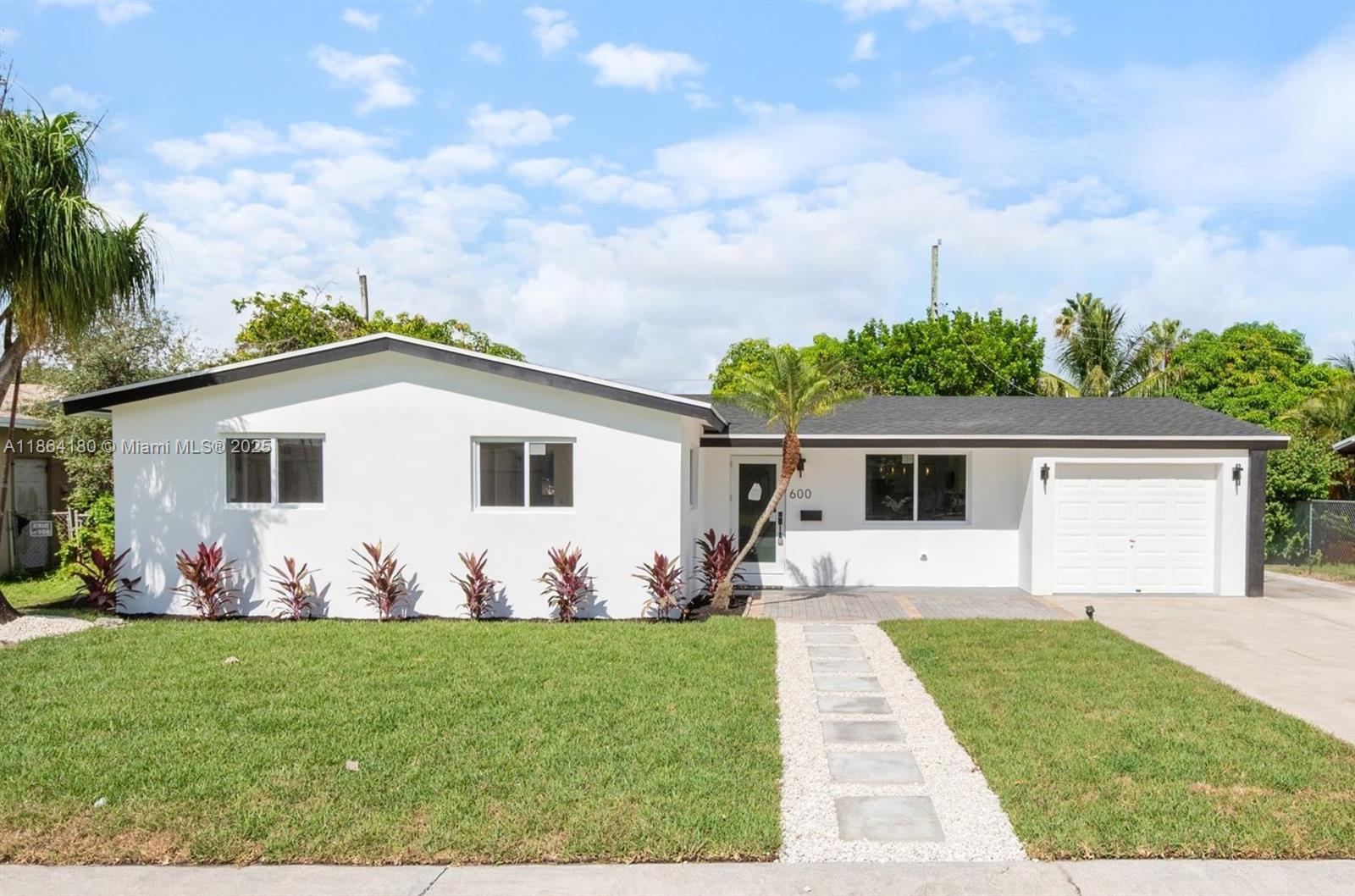 Don’t miss this rare opportunity to own a fully renovated 3-bedroom, 2-bath + den home in the highly sought-after Pines Village of Pembroke Pines. Offering 1,798 sq. ft. of beautifully reimagined living space, this home is truly move-in ready and designed to impress.
Step inside and fall in love with the brand-new kitchen featuring modern cabinetry, countertops, and stainless-steel appliances. Both bathrooms have been completely remodeled with contemporary finishes, and the versatile den offers the perfect flex space for a home office, playroom, or guest suite.
No detail has been overlooked: enjoy the peace of mind that comes with a new roof, new AC, new windows and doors, and fresh landscaping.