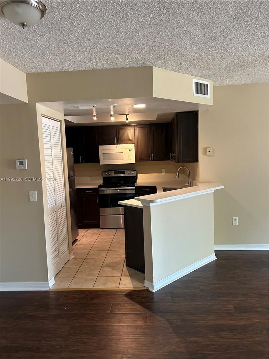 Photo of 4175 N Haverhill Rd #906, West Palm Beach, FL 33417 (MLS # A11992220)