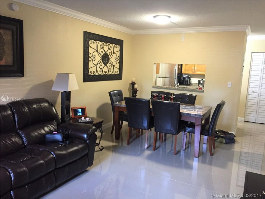 Recently remodeled first floor condo in Kendall,close to Florida Turnpike.Tile throughout with upgraded stainless steel appliances.Beautiful kitchen and bathrooms with wood cabinets and granite counter-tops.Washer and Dryer inside unit.New A/C installed in 2016.Association $227/M includes water,2 pools and security patrol.Pets under 20 pounds allowed .Ok to Lease.Tenant occupied until 4/30.Easy to show.