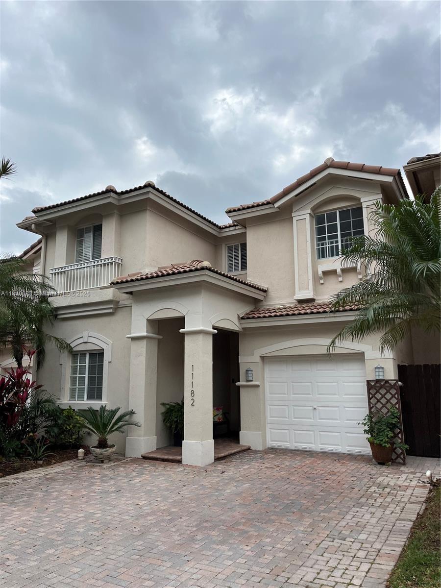 Beautiful well maintained 3 spacious bedrooms, 3 full Bathrooms house in a resort stile and guarded community. 1 bedroom and 1 bathroom downstairs that can be used as office, wood laminated floors throughout, spacious walking closet in the master room, brick paver patio. The community offers state of the art amenities, swimming pool, jacuzzi, gym, playground, soccer field, basketball field, softball field, tennis courts. Easy to show.
