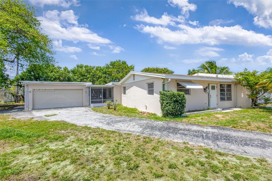 Welcome to the best home on the block! In this NO HOA home you get the size of two parcels for the price of one! Whether it be privacy and stability your looking for with a Concrete Block Construction Home or a Huge Detached Garage to to enjoy or convert as you and your family decide. You'll never find a home like this off prosperity farms with this much space. This home has been cleaned and repainted since last occupancy and has one updated bathroom and a fully updated kitchen.This home also comes with a fully standard size laundry room that can be doubled as a utility room at your desire. With the patio fully covered and screened in you never have to worry about getting rained on again! Enjoy all the benefits of this home & also check out the beach and mall both only 10 minutes away!!