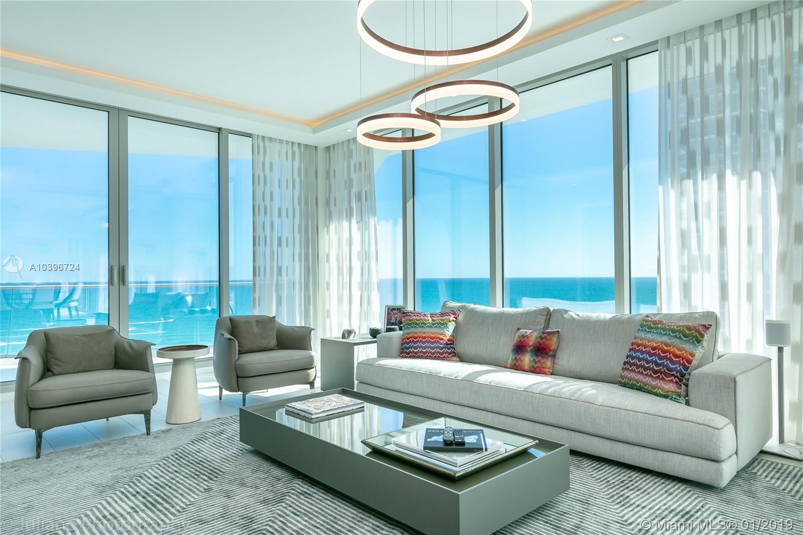 Appointed with the finest finishes and furnished with luxury and contemporary pieces by Artefacto and other Italian design brands, this plush residence is ready for move-in! Jade Signature is designed by Pritzker-prize-wining Swiss architect, Herzog and de Meuron with interiors by world-renown, Pierre Yves Rochon of Paris. This spacious corner residence features 4 bedrooms (convertible 5th bed) in addition to a family room and den. A glass jewel box, enjoy uninterrupted ocean views with glimmering skyline vistas, framed by floor-to-ceiling windows and appointed with 5 terraces. Hermes furnishings and accents adorn the common areas. Amenities feature on-sight dining, Tata-Harper spa, salon and water therapy; fitness facilities, yoga, pilates/spin studios and more.