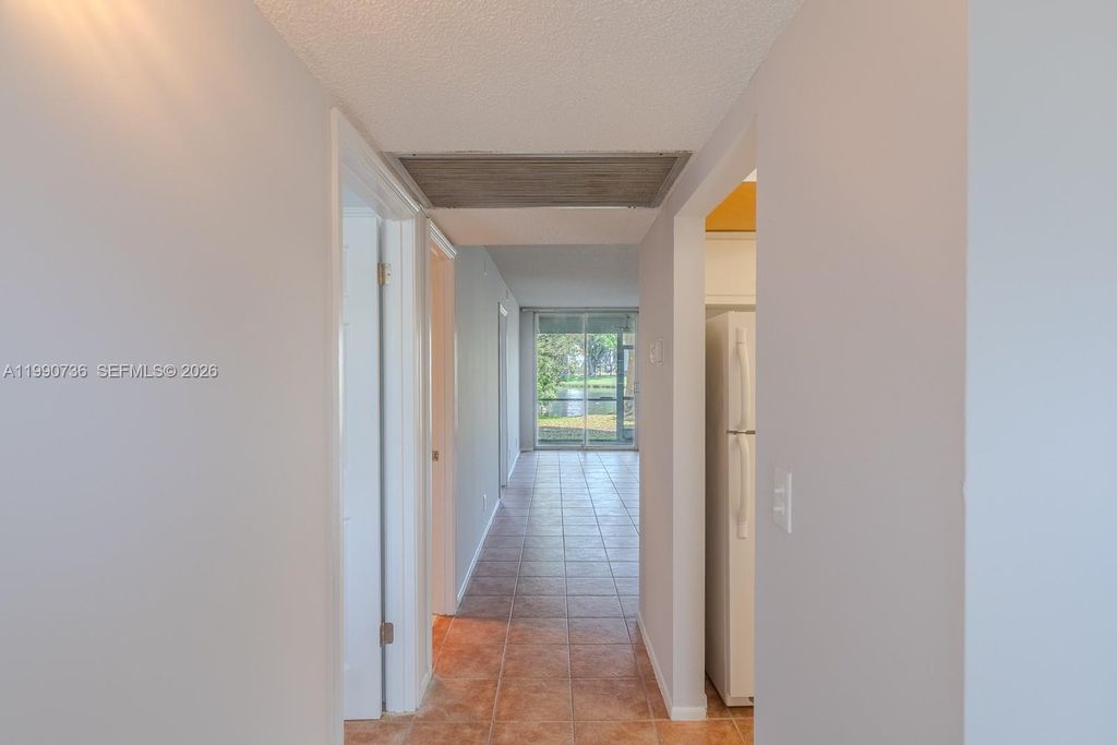 Photo of 9325 Lagoon Pl #105, Davie, FL 33324 (MLS # A11990736)