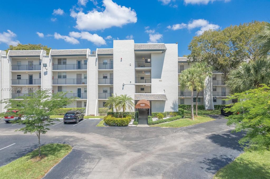 Photo of 9325 Lagoon Pl #105, Davie, FL 33324 (MLS # A11990736)