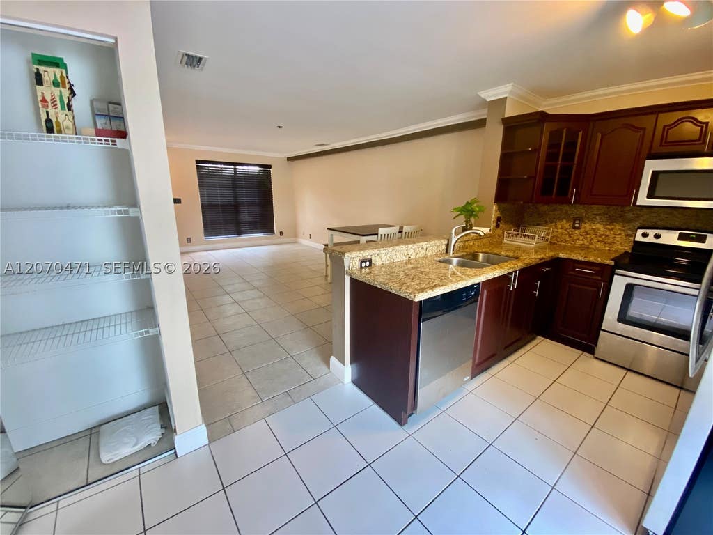 Photo of 2864 Cambridge Ln, Cooper City, FL 33026 (MLS # A12070471)