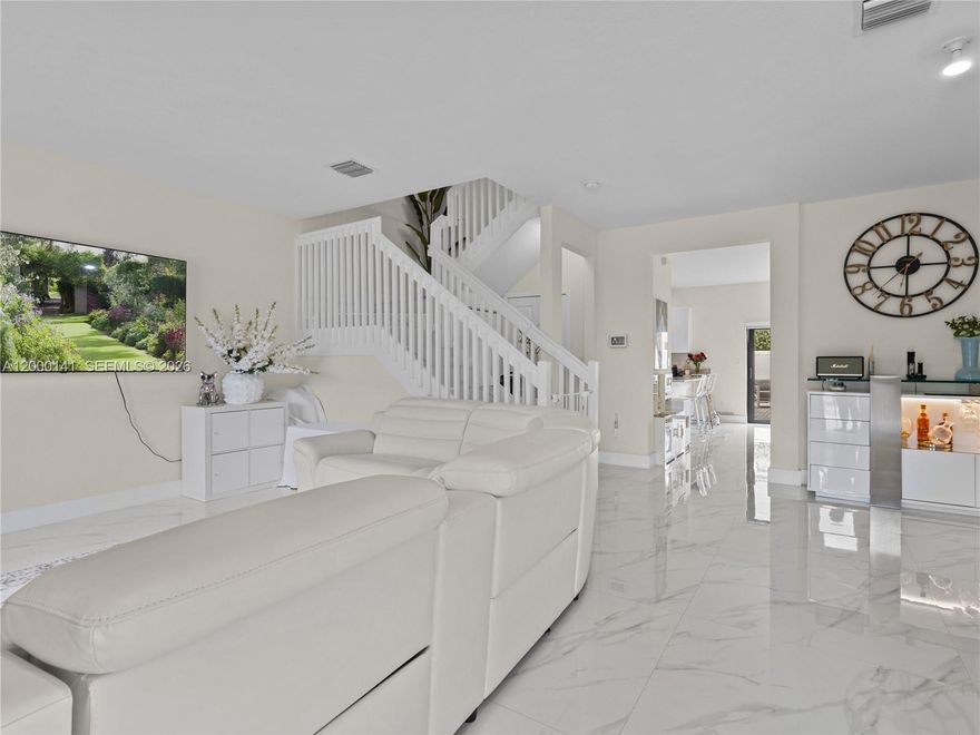 Beautifully maintained 3-bedroom, 2.5-bath townhouse located in the sought-after community of Aquabella. This move-in ready home features upgraded tile flooring throughout the entire property, including upstairs, downstairs, and the staircase, offering a clean and modern look. The bright white kitchen includes a spacious counter ideal for seating, perfect for everyday living and entertaining.

Step outside to a private patio with a custom pergola, creating the perfect space for outdoor dining and relaxation. Please note: shed in the backyard is excluded from the sale along with the chandelier in the dinning room.

Aquabella offers excellent amenities, including multiple pools, a fully equipped gym, clubhouse, recreational areas, and beautifully maintained lakes with seating areas. The community is family-oriented and features 24-hour security with on-site guard service.

A perfect combination of comfort, style, and lifestyle.