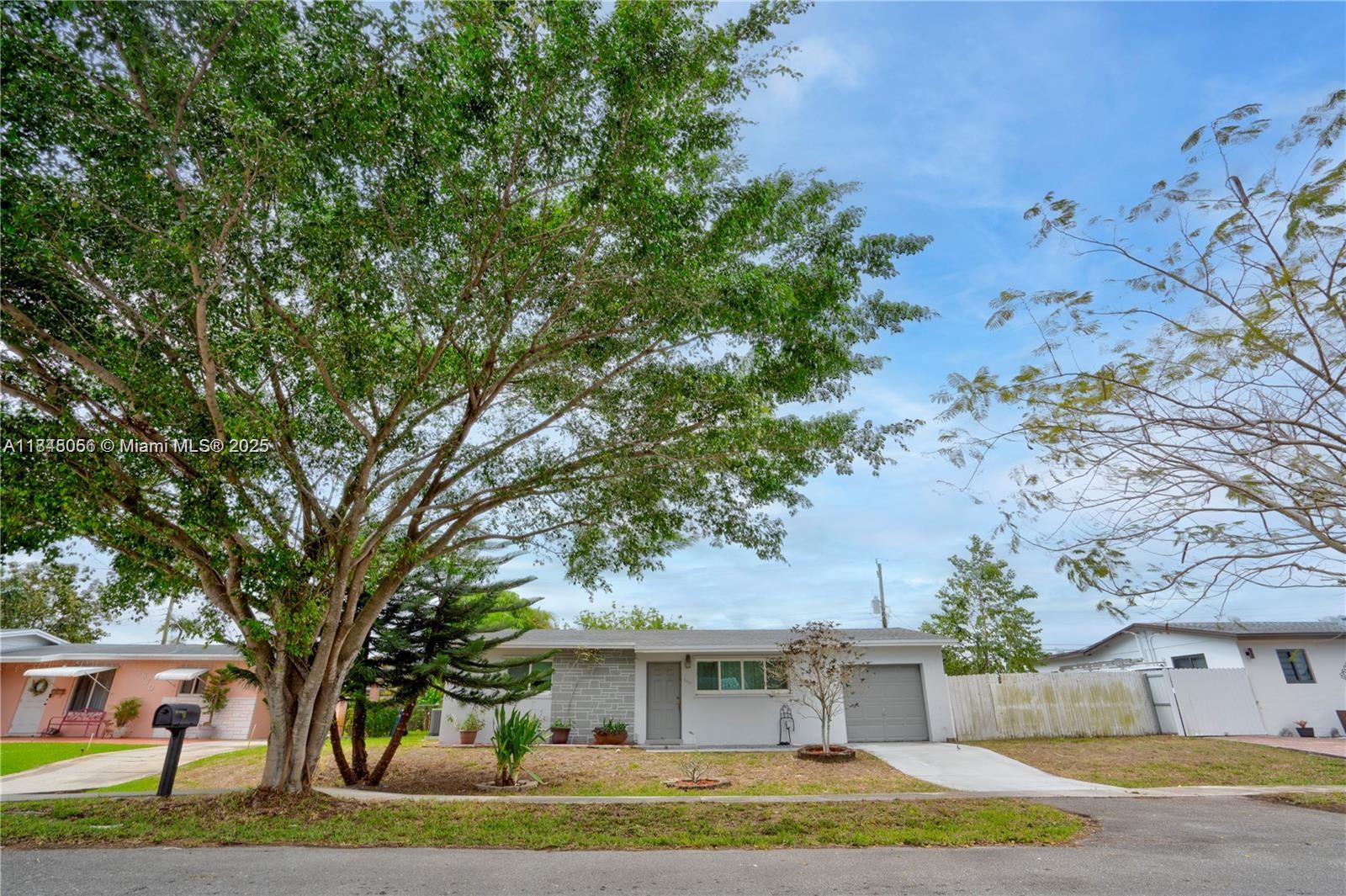 This delightful home offers a perfect blend of comfort and convenience. Situated in the highly desirable Palm Springs North community, this property is ideal for families and those seeking a peaceful yet accessible location. The home features 4 spacious bedrooms and 2 full bathrooms, living space of 1703 sq ft. The property sits on a generous 7,500 sq ft lot, providing ample outdoor space. New Roof (2021) and impact-resistant windows (2020), as well as a brand-new air conditioning system added in April 2024. Just blocks from top-rated schools and conveniently located near I-75 and the Palmetto Expressway, this home offers easy access to shopping, dining, and major highways, making it perfect for commuters and families.