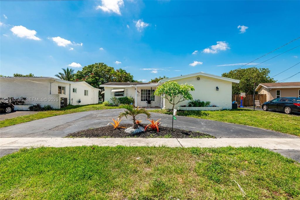 Photo of 8690 NW 24th Pl, Sunrise, FL 33322 (MLS # A12010565)