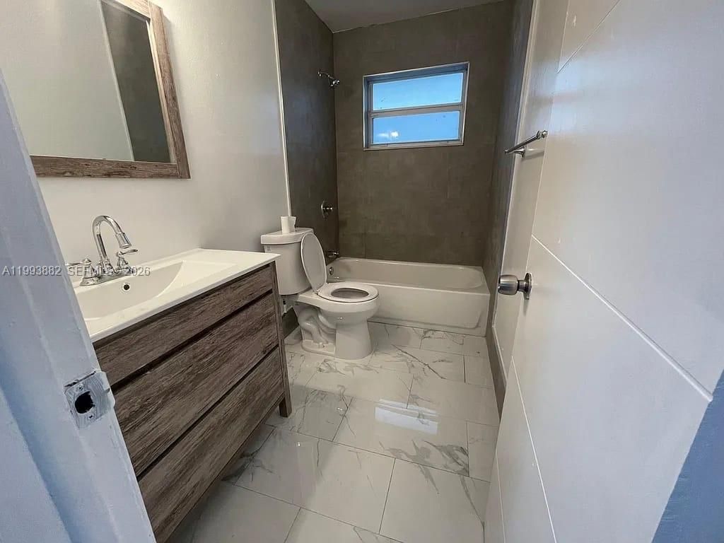 Photo of 3906 SW 12th Ct #1-4, Fort Lauderdale, FL 33312 (MLS # A11993882)