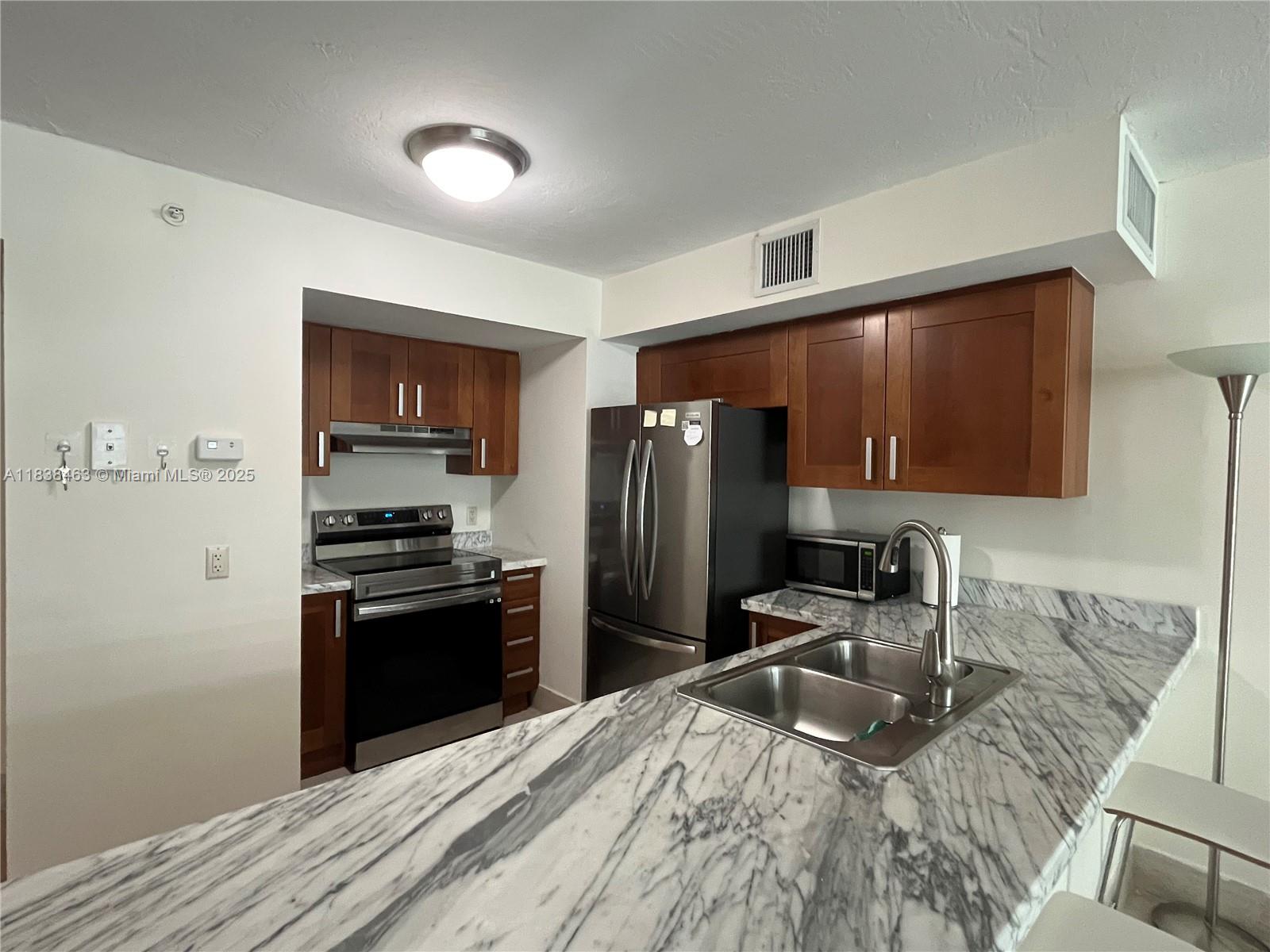 9499 Collins Ave 307