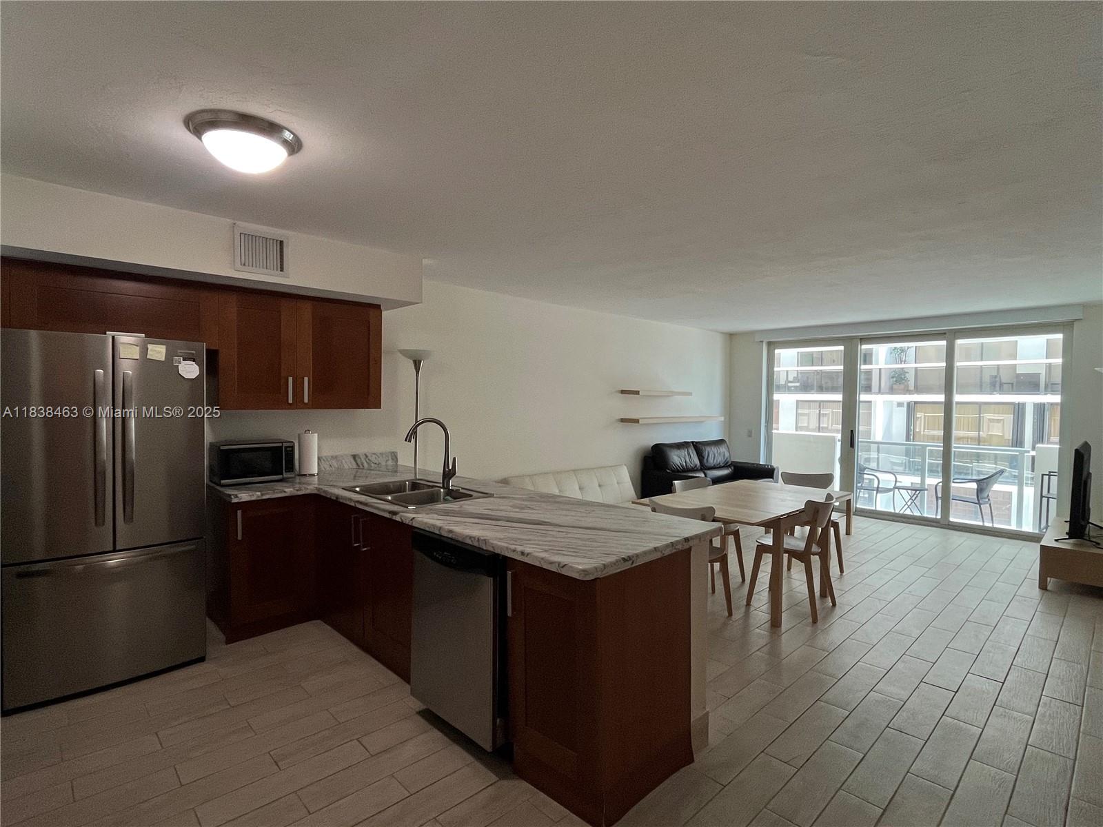 9499 Collins Ave 307